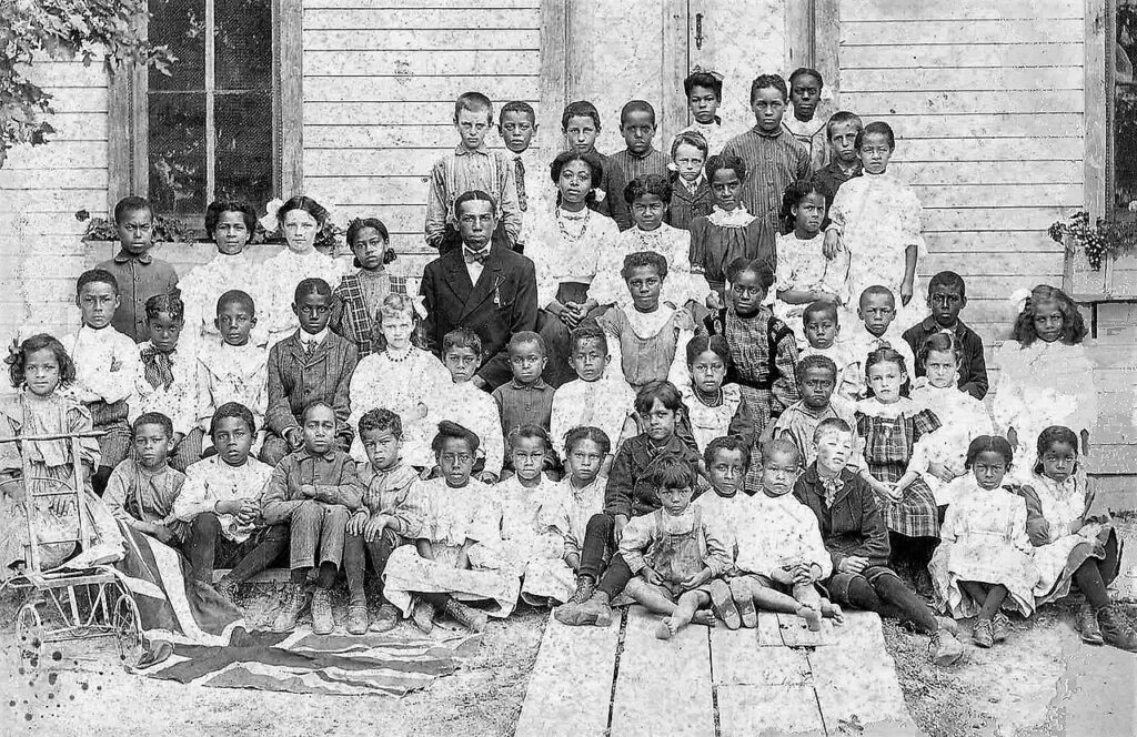 Class of 1909 1910 in front of the only school in Canada built by fugitive slaves Buxton Students outside the historic Buxton school in Ontario around 1909