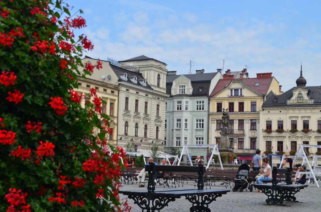 Cieszyn Poland Historic townhouses and red flowers in Cieszyn Market Square, Poland