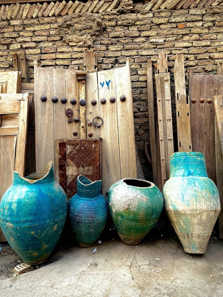 A group of vases sitting next to each other