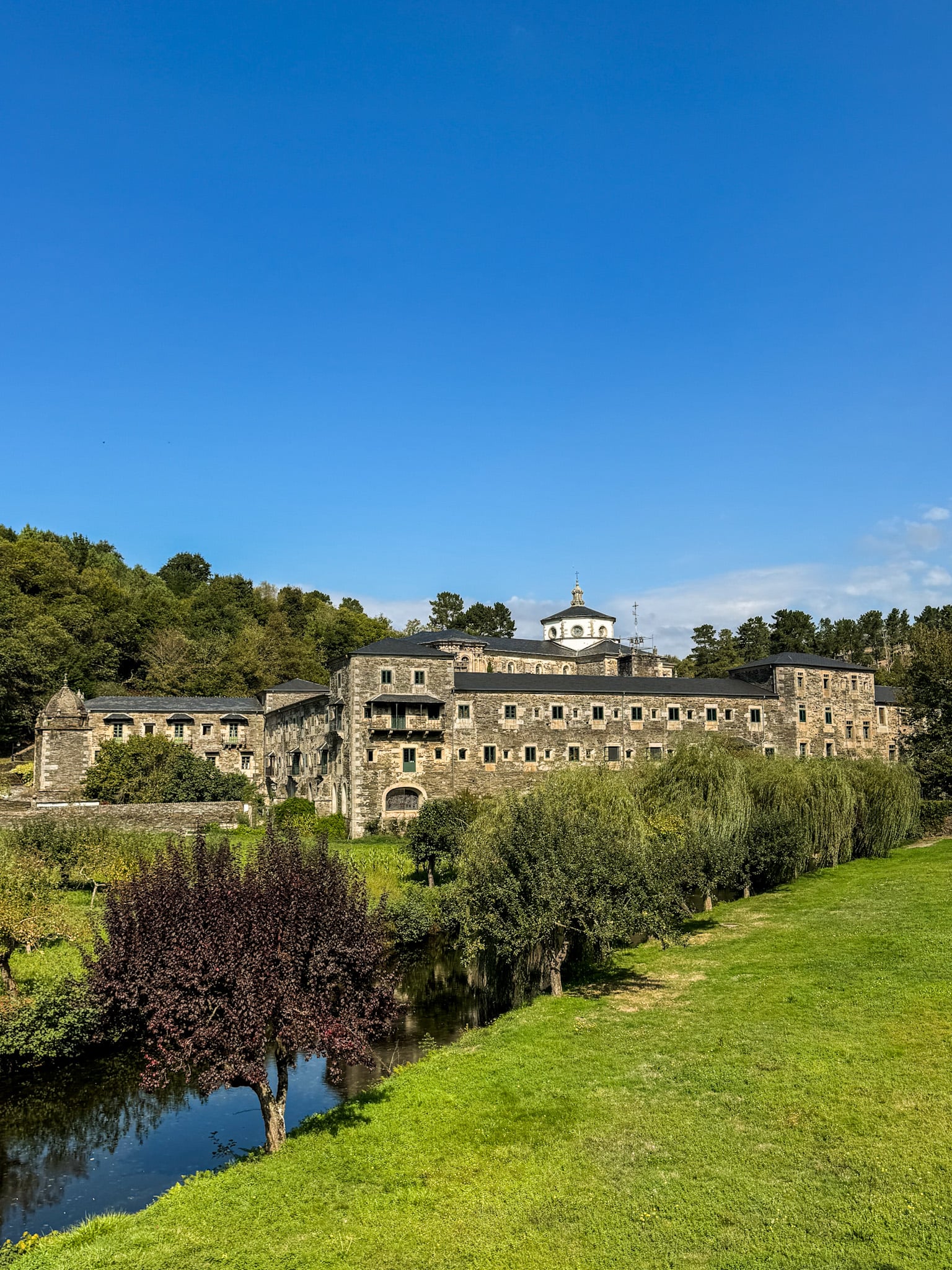 Camino Built in the sixth century, the Monastery of San Xulián de Samos is an active Benedictine monastery in Samos, Galicia, and a stop on the French Way Camino. Copy Camino Built in the sixth century, the Monastery of San Xulián de Samos is an active Benedictine monastery in Samos, Galicia, and a stop on the French Way Camino. Copy