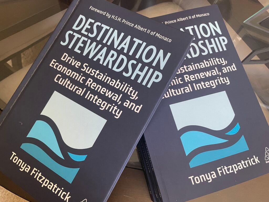 Copies of Destination Stewardship on a table