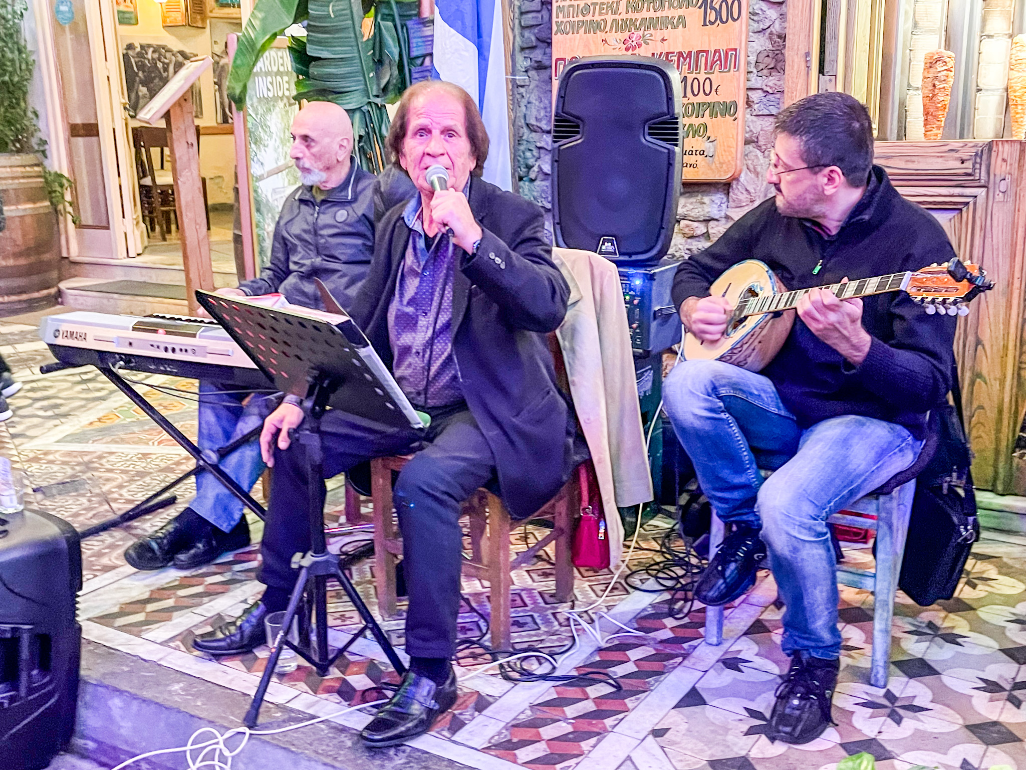 Psirri Live music is commonplace in vibrant Psyrri Three men playing instruments